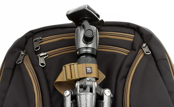 A close shot of a tripod being held in place using the Guide's Edition Synik 30's front lashpoint.